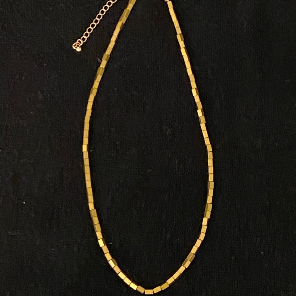 Faux gold necklace of gold color rectangle blocks